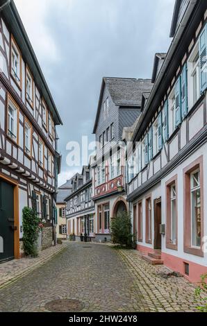 Street with half-timbered houses and cobblestones in Eltville am Rhein, Rheingau, Hesse, Germany