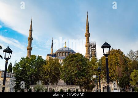 Blue Mosque, Sultan Ahmet Mosque, at dawn. The view of architecture, garden and facade in old town, Istanbul, Turkey Stock Photo
