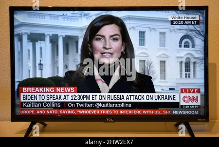 A TV screenshot of CNN White House reporter Kaitlan Collins reporting on the Russian Invasion of Ukraine. Stock Photo