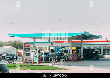 Dubai, UAE, United Arab Emirates - May 28, 2021: Car refuel at ENOC oil station in sunny summer day. ENOC, Emirates National Oil Company is global Stock Photo