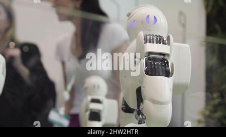 High Technology Future and Science Concept. Smart Humanoid Robots Dancing. Dancing robots. Future technology concept. Stock Photo