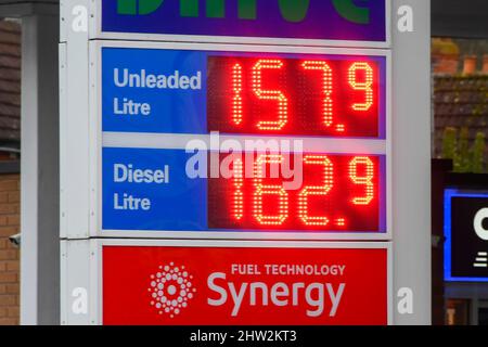 Bridport, Dorset, UK.  3rd March 2022. Fuel prices are increasing again due to the invasion of Ukraine by Russia.  The sign at the ESSO petrol station on the A35 at Bridport in Dorset is showing the price for unleaded petrol at 157.9p per litre and diesel at 162.9p per litre. Since 16th February 2022 unleaded fuel has increased at this petrol station by 7p a litre and diesel by 10p a litre.  Picture Credit: Graham Hunt/Alamy Live News Stock Photo