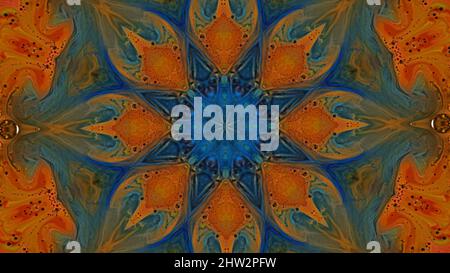 Abstract background with kaleidoscopic forms, trance and meditation concept. Acrylic bright paints forming round mandala pattern with a variety of sha Stock Photo