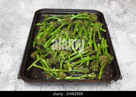 Roasted broccoli on a baking tray Stock Photo