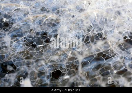 A soap bubbles, an extremely thin film of soapy water enclosing air in close up Stock Photo