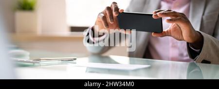 Remote Check Deposit Using Mobile Remote. Online Capture Stock Photo