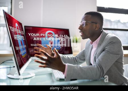 Ransomware Malware Attack. Hacked Business Computer. Cyber Security Breach Stock Photo