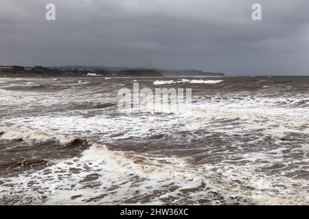Rough seas roll in from the North Sea, Scarborough North Beach Stock Photo