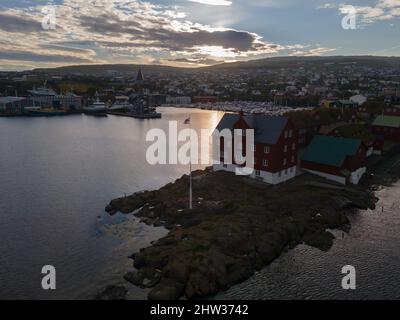 Beautiful aerial view of the city of Torshavn in the Faroe Islands and its classic colorful houses, red building with grass Stock Photo