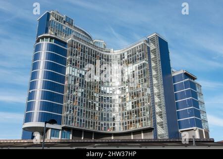 South facing facade of Falcon Wharf (34 Lombard Road), an impressive development on the side of the River Thames in London, UK. Stock Photo