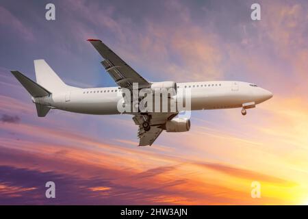 Beautiful sunset sky above clouds with dramatic light Stock Photo