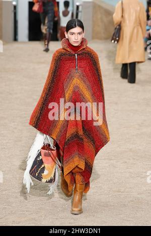 Paris, France. 3rd Mar, 2022. A model presents a creation of Chloe's Fall/Winter 2022 ready-to-wear collections during Paris Fashion Week in Paris, France, on March 3, 2022. Credit: Piero Biasion/Xinhua/Alamy Live News Stock Photo