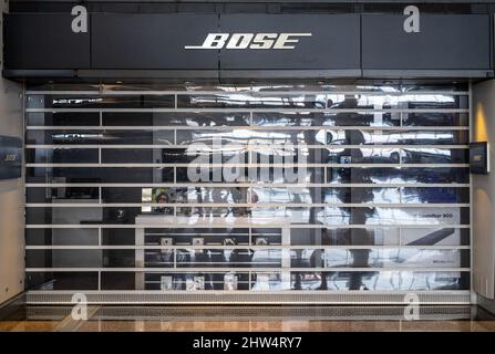 Hong Kong, China. 16th Feb, 2022. A closed American audio products brand Bose store seen at Hong Kong international airport as most business are shutdown due to the covid-19 variant spread. Credit: SOPA Images Limited/Alamy Live News Stock Photo