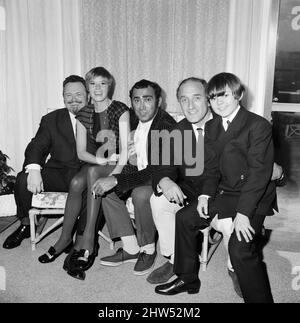 Some of the cast and the writer from the film Oliver!, at a reception for the film. Pictured, left to right, Harry Secombe who plays Mr Bumble, Shani Wallis who plays Nancy, the writer Lionel Bart, Ron Moody who plays Fagin and Jack Wild as The Artful Dodger. 25th September 1968. Stock Photo
