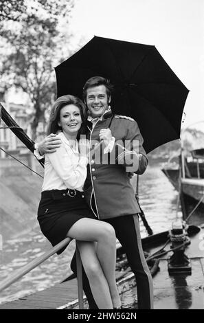 CROSSPLOT - Roger Moore with Claudie Lange while filming the 1969 film ...