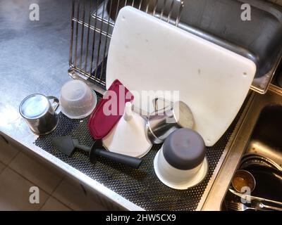 Clean kitchen utensils on the dashboard in a restaurant Stock Photo