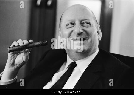 Media Mogul Lord Lew Grade smoking a cigar. 24th January 1967. Stock Photo