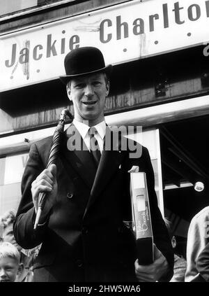 Jack Charlton Leeds United football player wearing suit & bowler hat, pictured outside shop with sign Jackie Charlton May 1967. Stock Photo