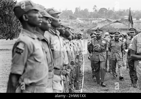 Colonel Ojukwu, the Military Governor of Biafra in Nigeria inspecting ...