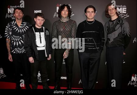 Mar 02, 2022 - London, England, UK - Jordan Fish, Lee Malia, Oliver Sykes, Mat Nicholls and Matt Kean of Bring Me The Horizon attends The NME Awards 2 Stock Photo