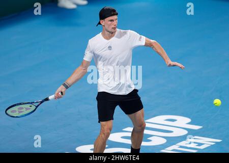 Marton Fucsovics, of Hungary, plays a shot to Gabriel Diallo, of Canada