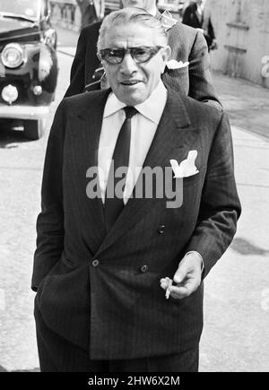 Greek shipping tycoon Aristotle Onassis attends the Law Courts in London to sue 77 year old Panaghis Vergottis, a Greek ship owner in connection with a deal involving the £1,200,000 freighter 'Artemision 11'. Picture shows Aristotle Onassis arriving at the Law Courts. 17th April 1967. Stock Photo