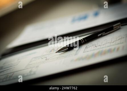 Drawings and charts of successful business, workplace of the businessman Stock Photo