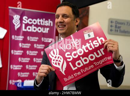 Scottish Labour leader Anas Sarwar holds a poster showing the new Scottish Labour logo during the Scottish Labour conference at Glasgow Royal Concert Hall. Picture date: Friday March 4, 2022. Stock Photo