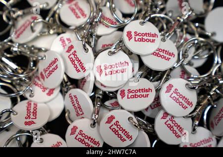 Keyrings with the new Scottish Labour logo on them at a stall during the Scottish Labour conference at Glasgow Royal Concert Hall. Picture date: Friday March 4, 2022. Stock Photo