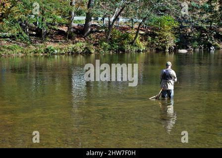 Unrecognizable old man fishing in the little river Gatlinburg Tennessee Stock Photo