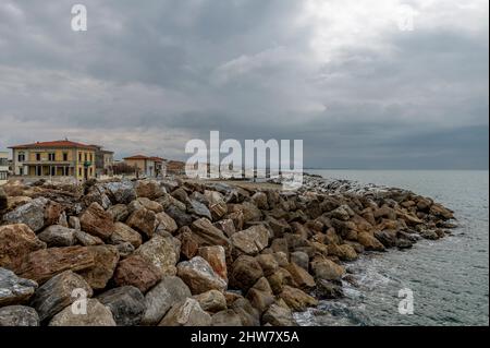 Panoramic view of the cliff and promenade of Marina di Pisa, Italy, on a cloudy day Stock Photo