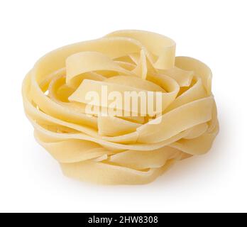 Uncooked nest of tagliatelle pasta isolated on white background with clipping path Stock Photo