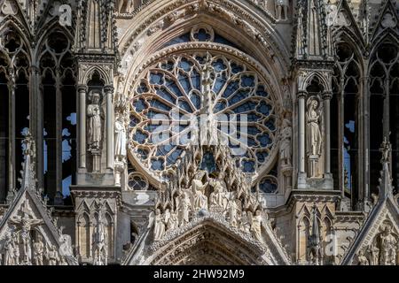 REIMS, FRANCE - FEBRUARY 11th, 2022: Coronation of the Virgin, gable of the central portal, detail of the west facade of Reims cathedral Stock Photo