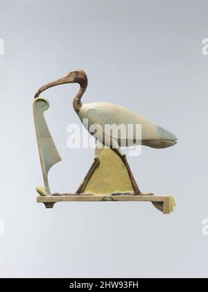 Art inspired by Inlay depicting Thoth as the ibis with a maat feather, Late Period–Ptolemaic Period, 4th century B.C., From Egypt; Possibly from Middle Egypt, Hermopolis (Ashmunein; Khemenu), Faience, H. 15.5 cm (6 1/8 in.); W. 1 cm (3/8 in.); L. 15.6 cm (6 1/8 in.), This exquisite, Classic works modernized by Artotop with a splash of modernity. Shapes, color and value, eye-catching visual impact on art. Emotions through freedom of artworks in a contemporary way. A timeless message pursuing a wildly creative new direction. Artists turning to the digital medium and creating the Artotop NFT Stock Photo