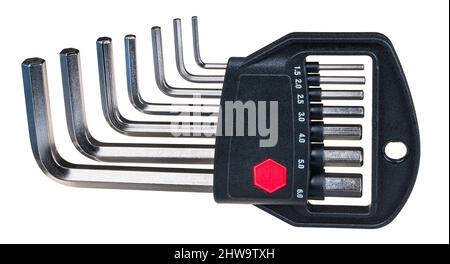 Steel hex key set of various size in a plastic holder. Closeup of metal Allen wrench toolkit in black box with metric scale or hanging hole. Screwing. Stock Photo