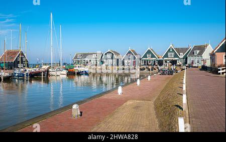 Scenic view of the harbour with ancient wooden houses in Marken, a village on a small peninsula just north of Amsterdam. Stock Photo