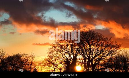 The sky seemed on fire over the town of Burnley In Lancashire in Northern England from my studio window. Stock Photo