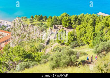 9th century temple of Diana, megalithic structure on slope of La Rocca, Cefalu, Sicily, Italy Stock Photo