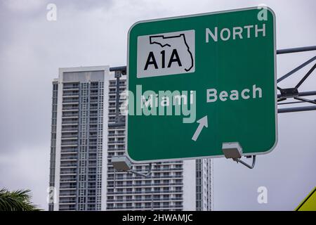 Street sign to Miami Beach and A1A - MIAMI, FLORIDA - FEBRUARY 14, 2022 Stock Photo