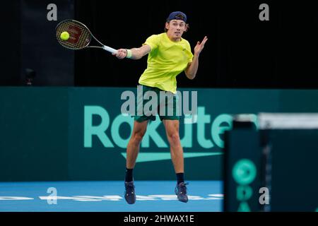 Marton Fucsovics, of Hungary, plays a shot to Alexis Galarneau, of