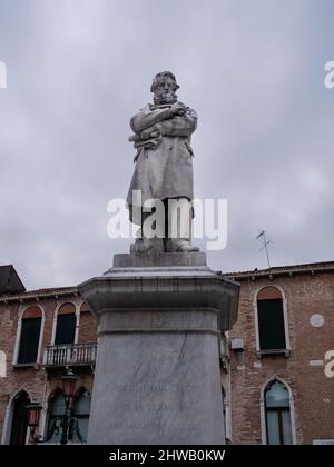 Nicolo Tommaseo Statue on Campo San Stefano in Venice, Italy, made by Francesco Barzaghi in 1882 with inscription 'To Nicolo Tommaseo from the Venetia Stock Photo