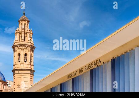 View of Mercat de Russafa (Russafa market) and church bell tower Stock Photo