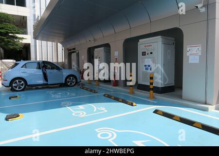 GWM EV charge station with ORA car, Siam Square, Bangkok , Thailand. Stock Photo