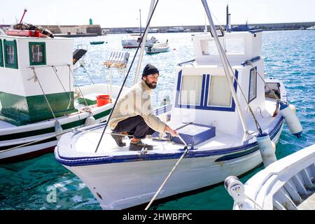 sailor bearded man in the harbor Stock Photo