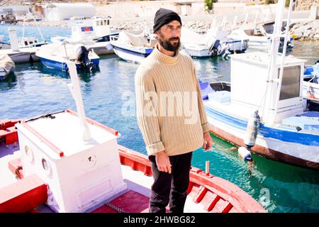 sailor bearded man in the harbor Stock Photo