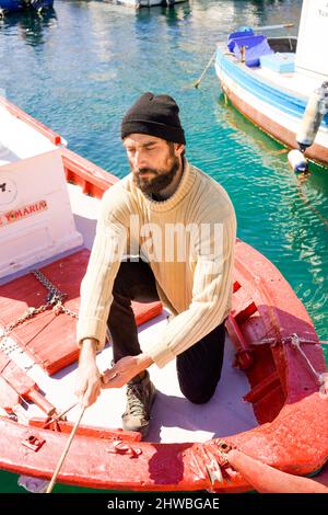 sailor bearded man in the harbor Stock Photo