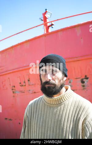 sailor bearded man in the harbor Stock Photo