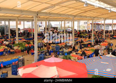 February 09 2022 - Avsallar, Alanya, Turkey: Sales of fresh fruits and vegetables at traditional street market (bazaar) Stock Photo