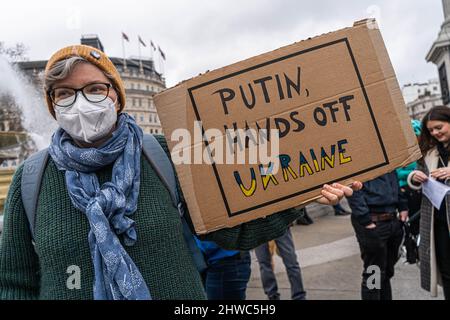 LONDON, UK. 5  March, 2022.  Protesters  gathered in Trafalgar Square    against the invasion of Ukraine  now in it's tenth day and to demand tougher action by  NATO and  a no fly zone to protect Ukrainian civilians from Russian military attacks. Credit: amer ghazzal/Alamy Live News Stock Photo
