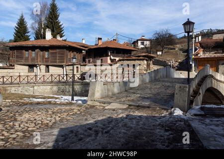 KOPRIVSHTITSA, BULGARIA - JANUARY 25, 2020: Typical Street and old houses in historical town of Koprivshtitsa, Sofia Region, Bulgaria Stock Photo